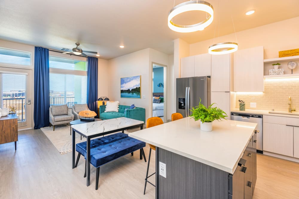 Spacious living room and kitchen at Zeta Luxury Apartments in Sacramento, California