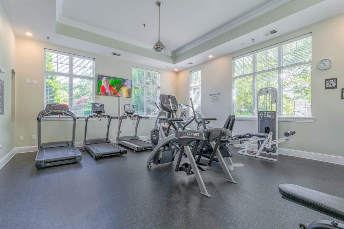 fitness center with dumbbells at Century Clearbrook, Frederick, Maryland