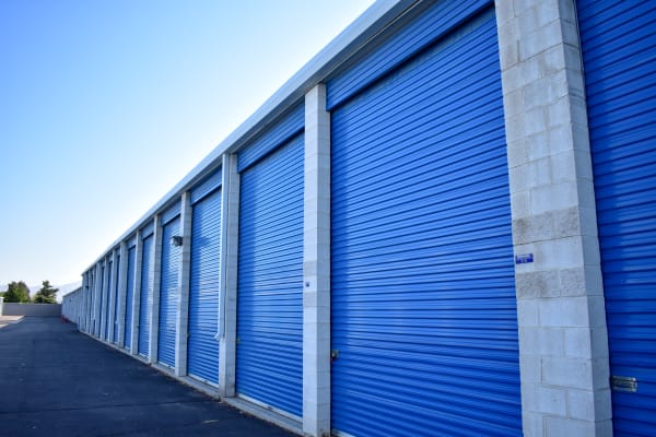 Blue doors on large exterior storage units at STOR-N-LOCK Self Storage in Cottonwood Heights, Utah