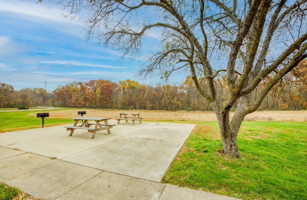 picnic tables outside at River Run Apartments in Macomb, Illinois