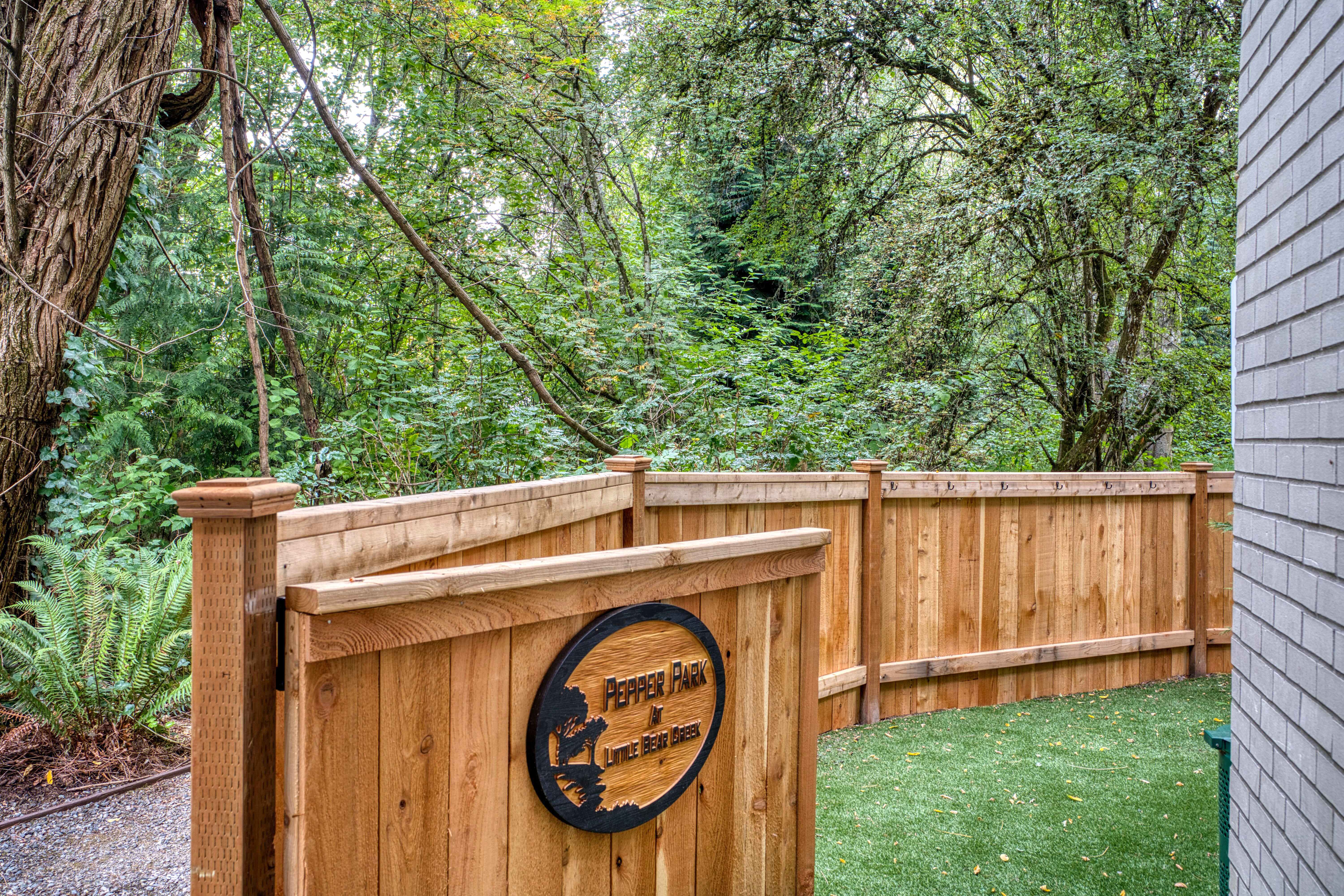 Wooden logo at The Creekside in Woodinville, Washington