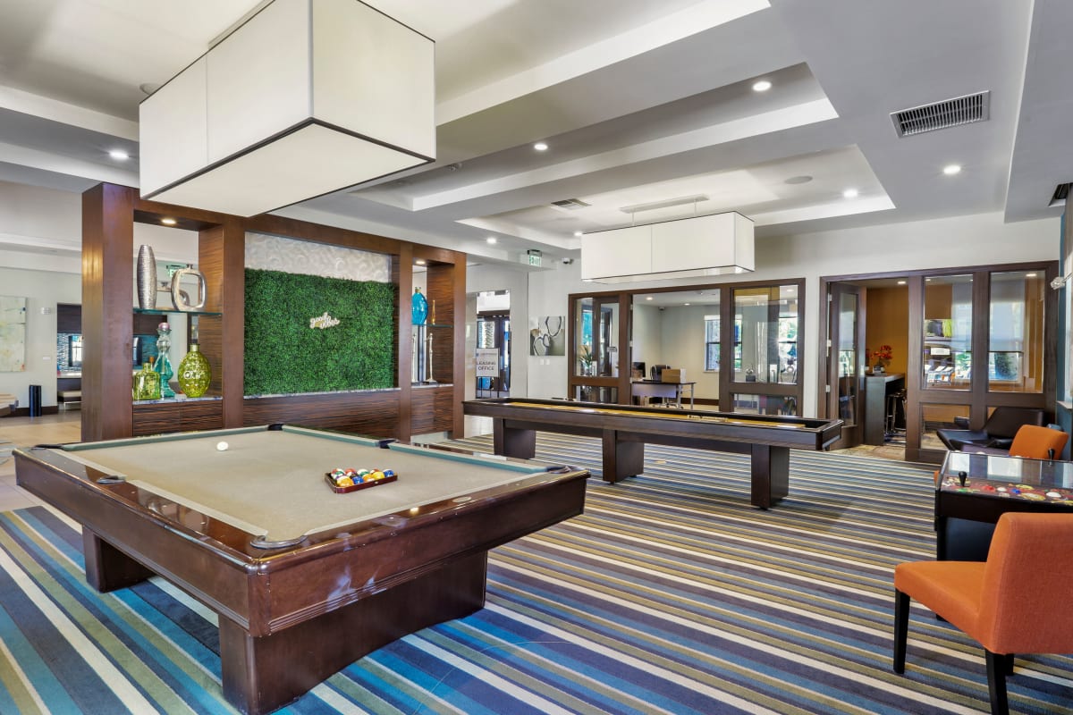 Clubhouse with pool table at Lantower Brandon Crossroads in Tampa, Florida
