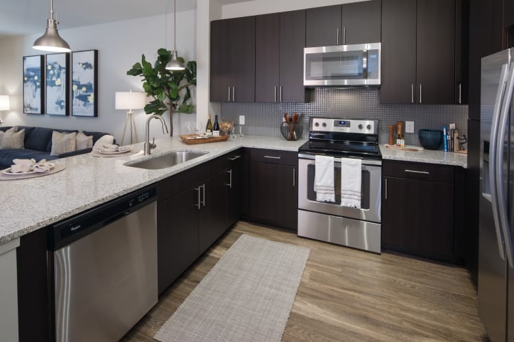 Fully-equipped kitchen at Leigh House Apartment Homes in Raleigh, North Carolina