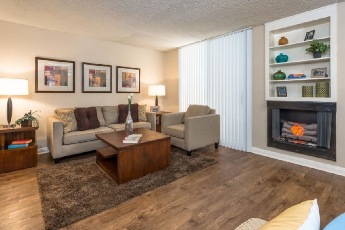 Apartment with wood-style floor and fireplace at Ariel Court, Los Angeles, California