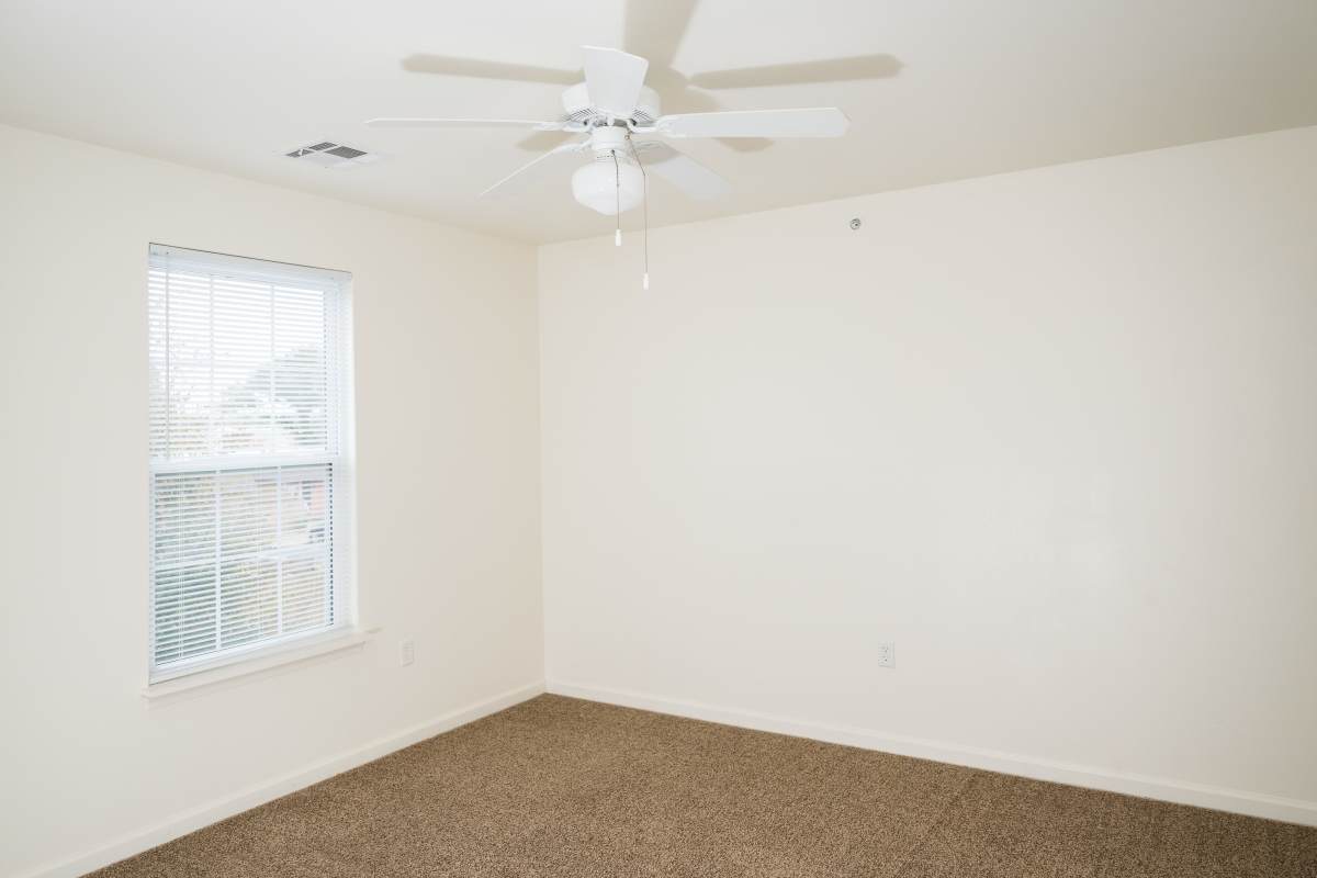  Unfurnished room with ceiling fan at Cascade Villas in Wichita Falls, Texas 