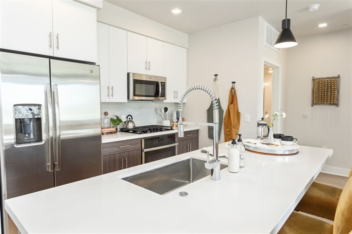 Kitchen with stainless-steel appliances at The Retreat at Rio Salado, Tempe, Arizona