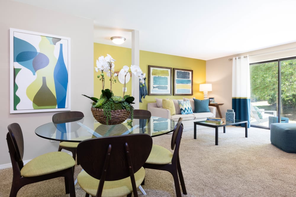 Large seating area in a model home at Madison Sammamish Apartments in Sammamish, Washington