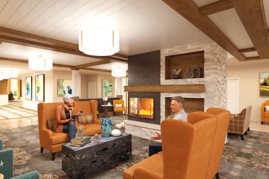 Residents seated in the community clubhouse at The Alexander in Bend, Oregon