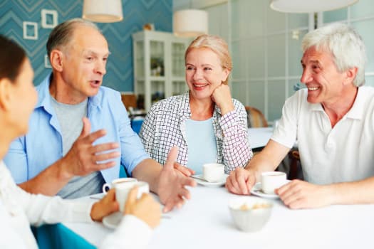 Residents chatting over a cup of tea at The Alexander in Bend, Oregon