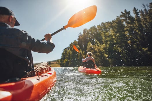 Residents kayaking near The Alexander in Bend, Oregon