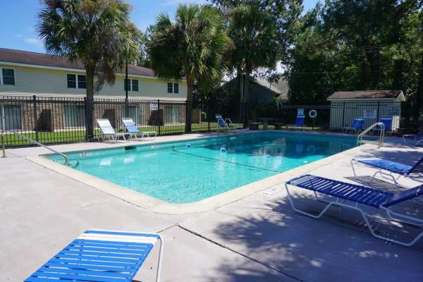 Resort-style swimming pool at Crown Villa Apartments in Savannah, Georgia