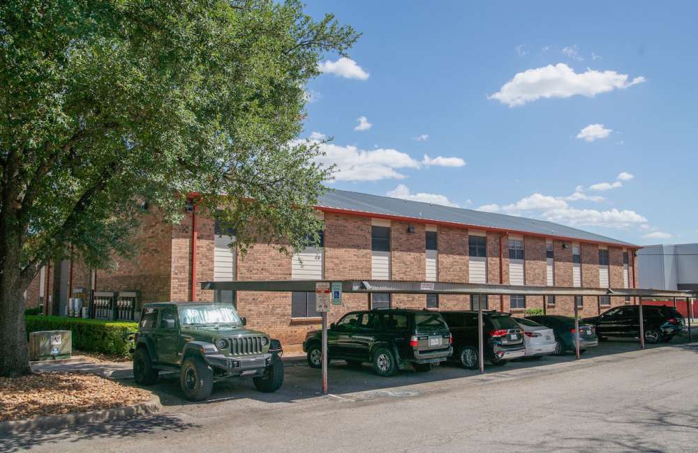 Building with car parking at Sierra Ridge in Austin. TX