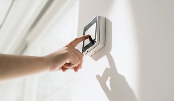 A staff member using a keypad at Anthology of Novi - OPENING 2020 in Novi, Michigan