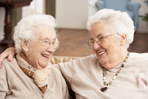 Friends at Discovery Commons At Wildewood in California, Maryland laughing together