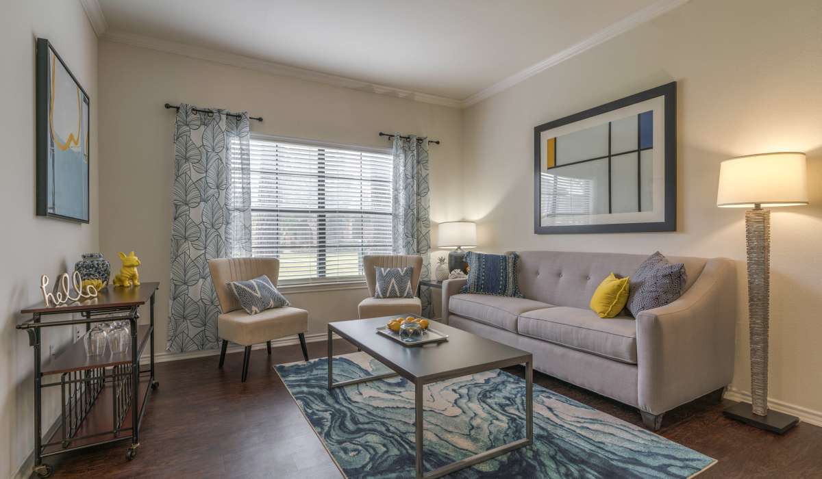 Well-furnished apartment living area at Edgewater at Klein in Spring, Texas