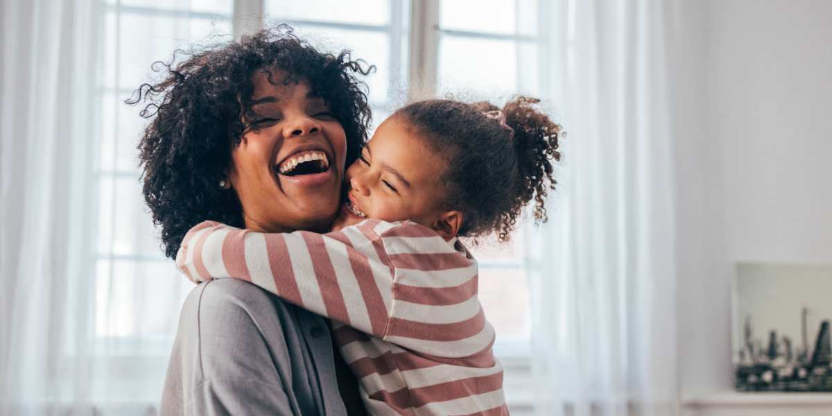 Happy family at Mint Place Apartments in Longview, Washington