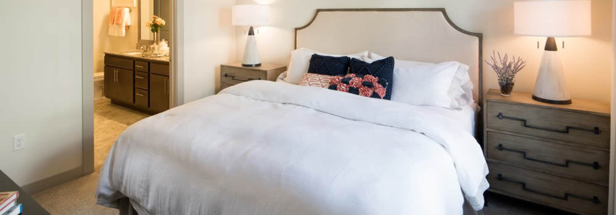 Modern bedroom with bathroom at The Marling in Madison, Wisconsin
