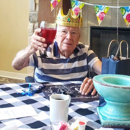 Resident celebrating a birthday at The Oxford Grand Assisted Living & Memory Care in McKinney, Texas