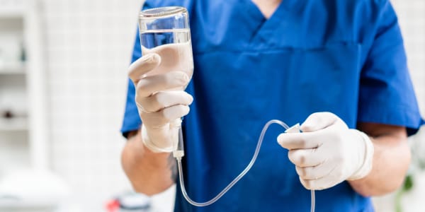 Nurse changing fluids for a resident at Ingleside Communities in Mount Horeb, Wisconsin