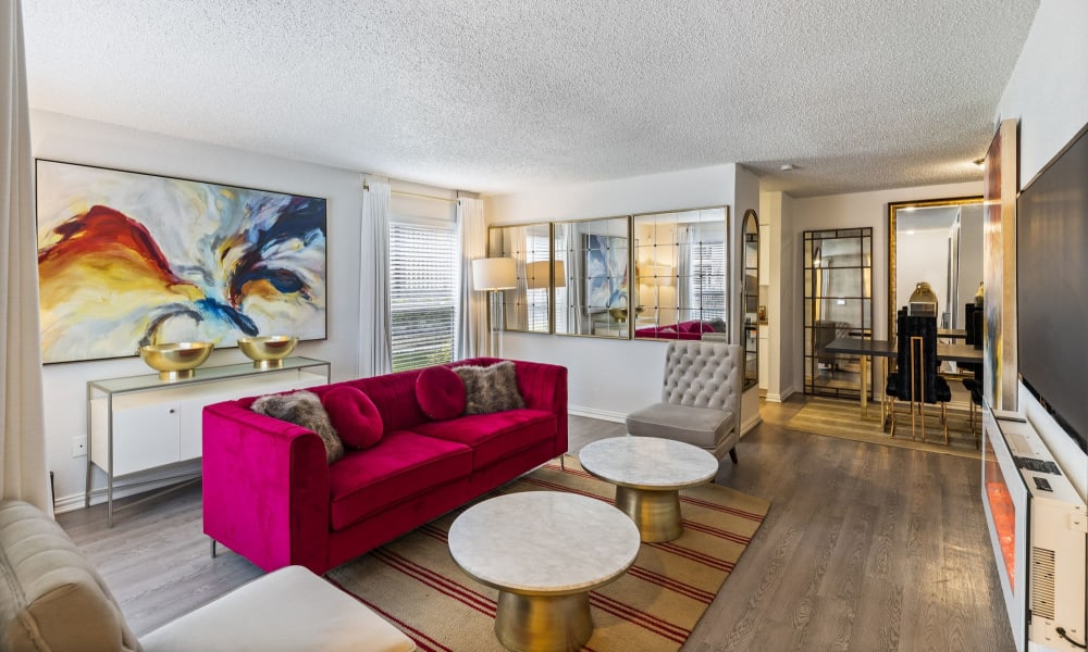 Model living room in an apartment at The Estates at Avenstar in Houston, Texas