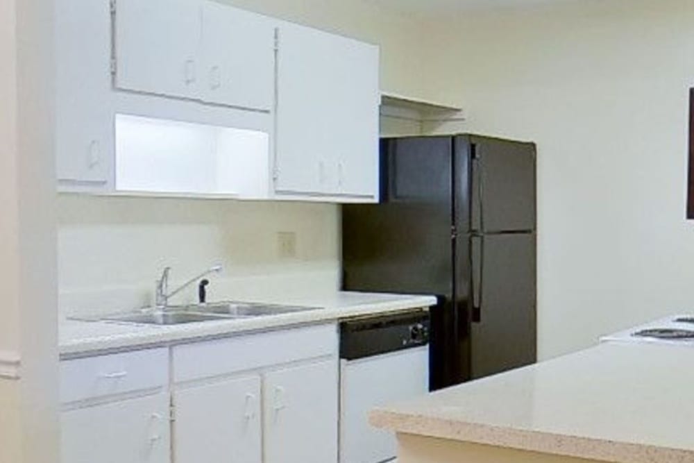 Kitchen with lots of cabinets at Greenleaf Apartments in Phenix City, Alabama