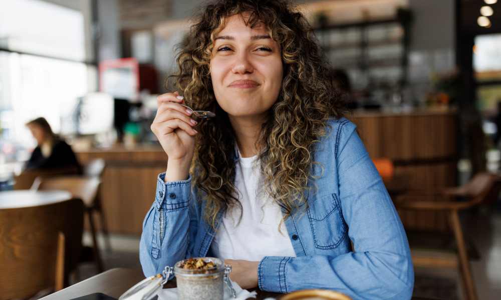 Resident enjoying some fine dining near Avonlea Westside in Atlanta, Georgia
