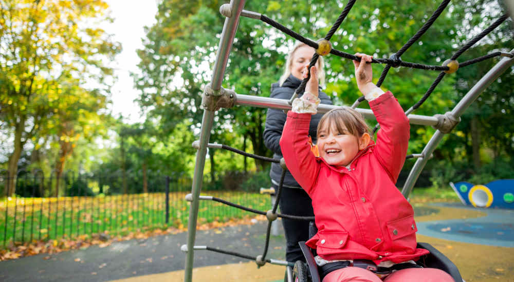 Resident kid playing in the playarea in the park near Orange Grove in Garden Grove, California