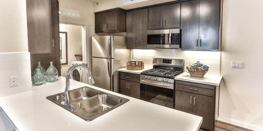 Kitchen with stainless-steel appliances at Garnet Creek in Rocklin, California