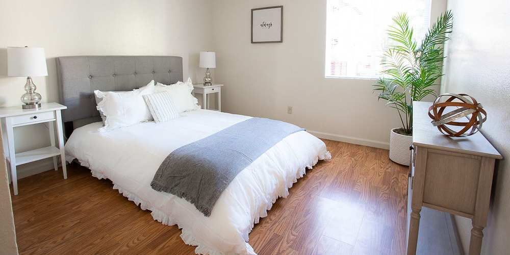Comfortable bedroom at Walnut Apartments in Santa Rosa, California