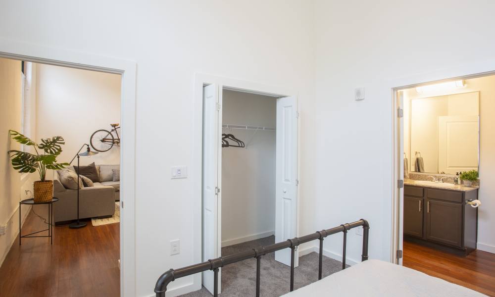 View of closet and living area from the bedroom at Lofts at Inman Mills in Inman, South Carolina