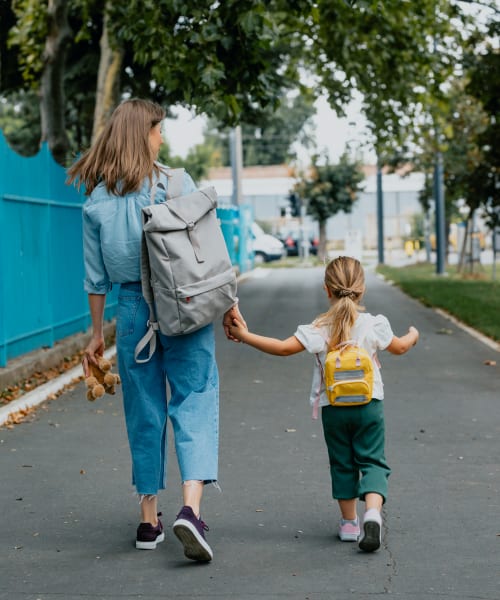 Mother and her daughter going for a fun walk at Dragas Home Rentals in Virginia Beach, Virginia