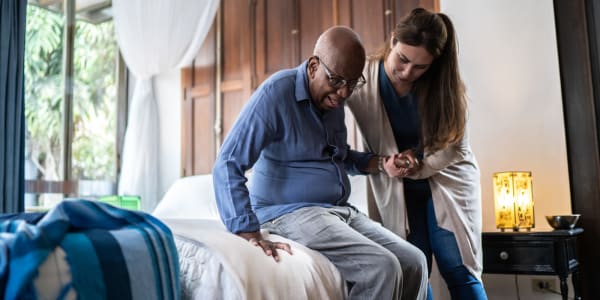 Resident being helped out of bed at Ingleside Communities in Mount Horeb, Wisconsin