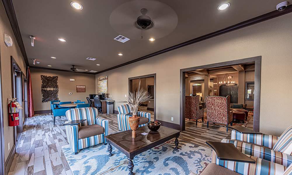 Clubhouse with lots of seating area at Sunset Lodge in Odessa,Texas