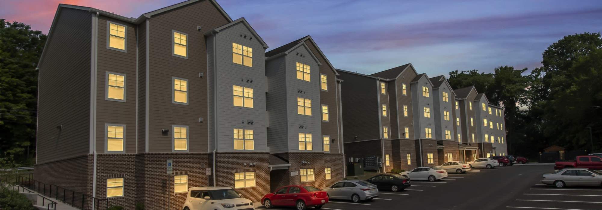 Rendering of apartments at night at Magnolia Greene in Lavale, Maryland