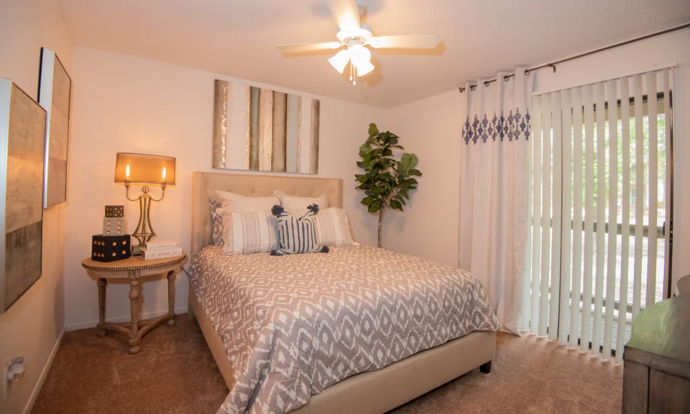 Spacious bedroom with plush carpeting at The Trace of Ridgeland in Ridgeland, Mississippi