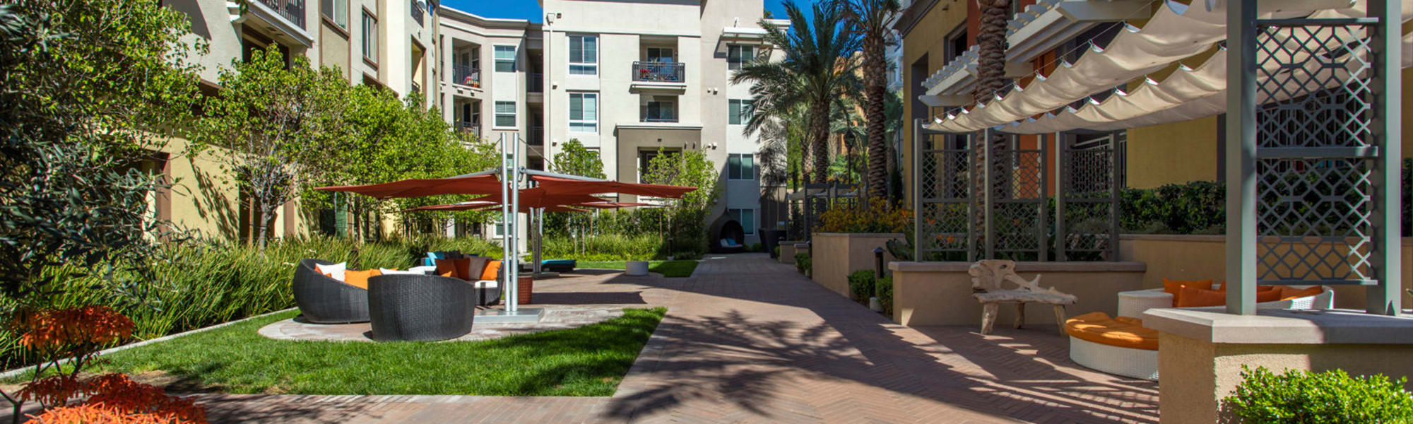 Photos of The Boulevard Apartment Homes featuring beautiful landscaping in Woodland Hills, California