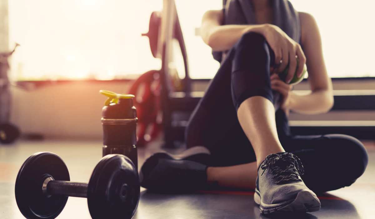 Resident in the fitness center at Muse Milford in Milford, Connecticut