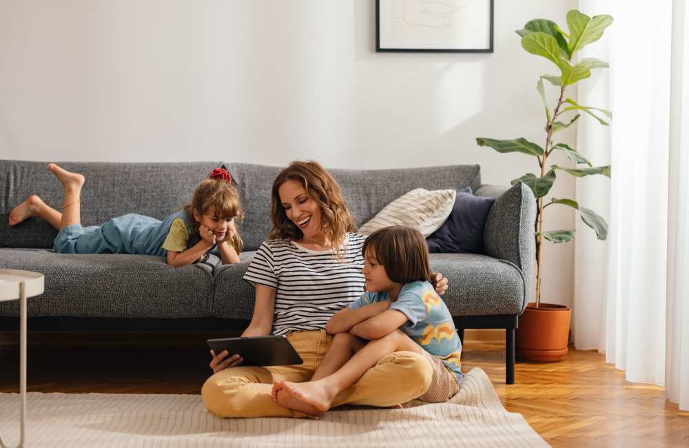 Resident with her kids at Hillside Apartments in Laredo, Texas
