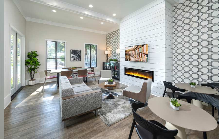 Spacious clubhouse with wood-style flooring at Cotton Wood Apartments in Dublin, California,