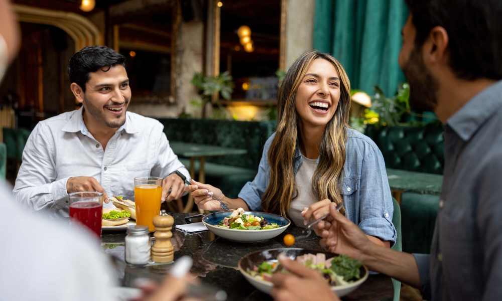 Residents enjoying a lunch at their favorite restaurant near Savannah Square & Savannah Harbor in Norman, Oklahoma