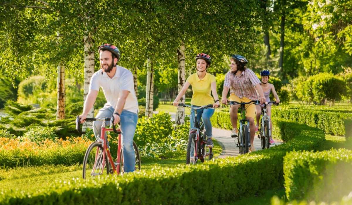 Residents cycling in the park near Muse Milford in Milford, Connecticut
