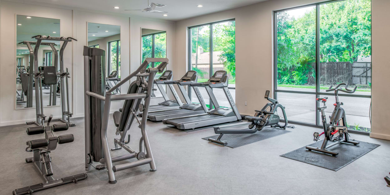 Fully equipped fitness center at Luxia Swiss Avenue, Dallas, Texas