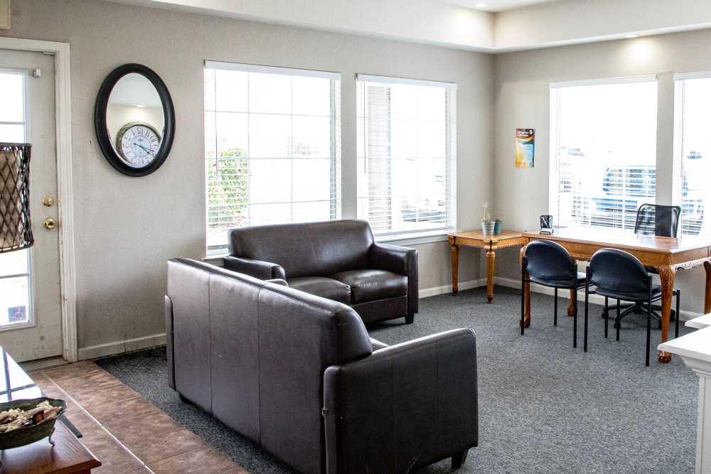 Leather sofa in the leasing office at Whispering Plains Apartments in Guymon, Oklahoma