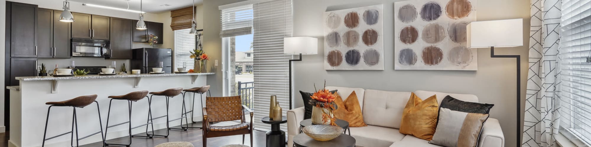 Photo of Luxurious Living Room Staged with Cream Colored Furniture