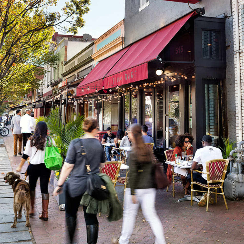 Bustling activity outside a local's favorite restaurant near The Bixby in Washington, District of Columbia