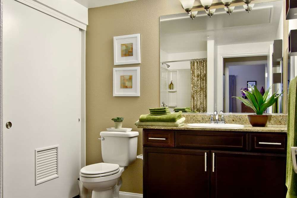 Modern bathroom with large mirror at Acapella in Las Vegas, Nevada