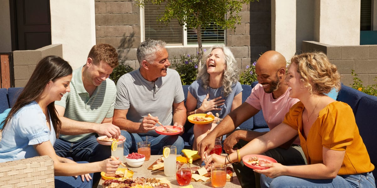 Residents enjoying snacks and drinks at BB Living at Civic Square in Goodyear, Arizona