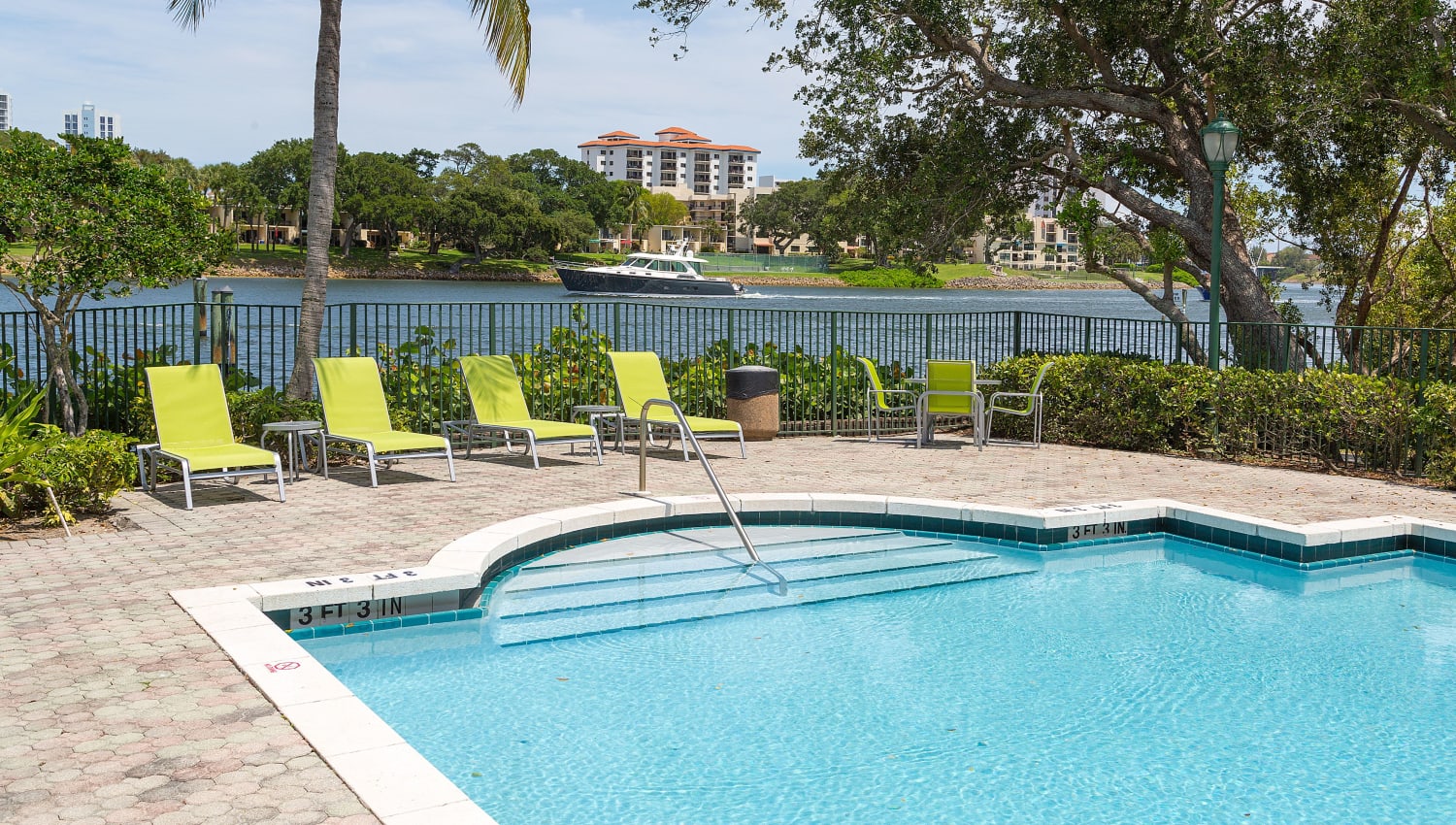 Waterfront park at Sanctuary Cove Apartments in West Palm Beach, Florida