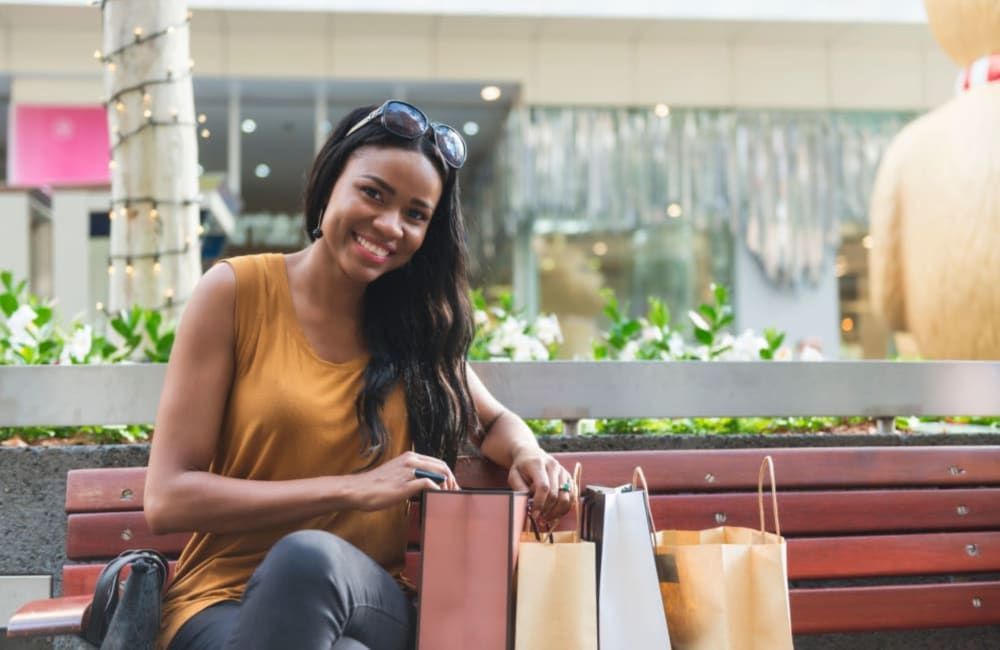 A resident enjoys shopping near Stratford Place at Brownstown in Brownstown, Michigan