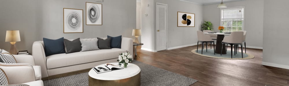 A spacious apartment living room and dining room at Briarcliff Apartment Homes in Milledgeville, Georgia